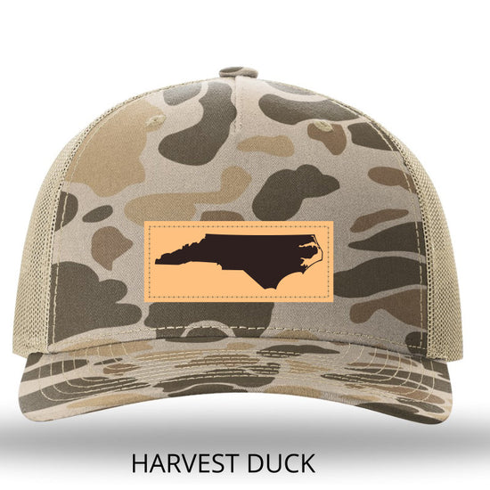 NC Outline Rectangle Leather Patch -Harvest Duck Camo/Light Tan Richardson 112PFP Snapback Trucker Hat Lost Wando Outfitters