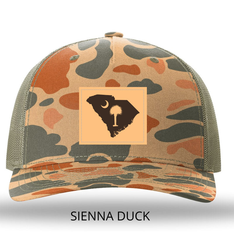 SC Outline Rectangle Leather Patch- Sienna Duck Camo-Loden Richardson 112PFP Trucker Hat - Lost Wando Outfitters - Lost Wando Outfitters